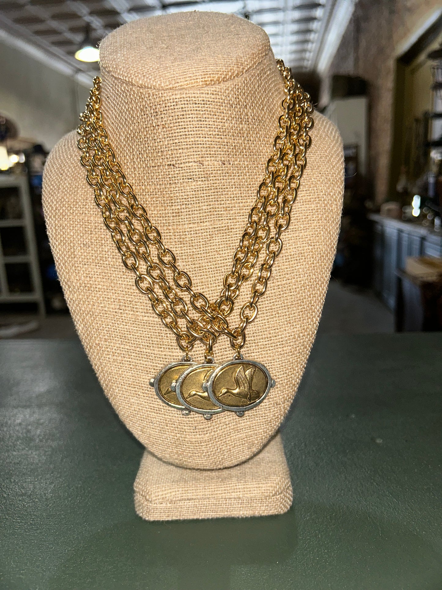 Brushed Gold/Mixed Metal Flying Duck Pensant in Gold link chain