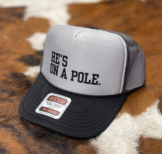 He's On A Pole Trucker Hat