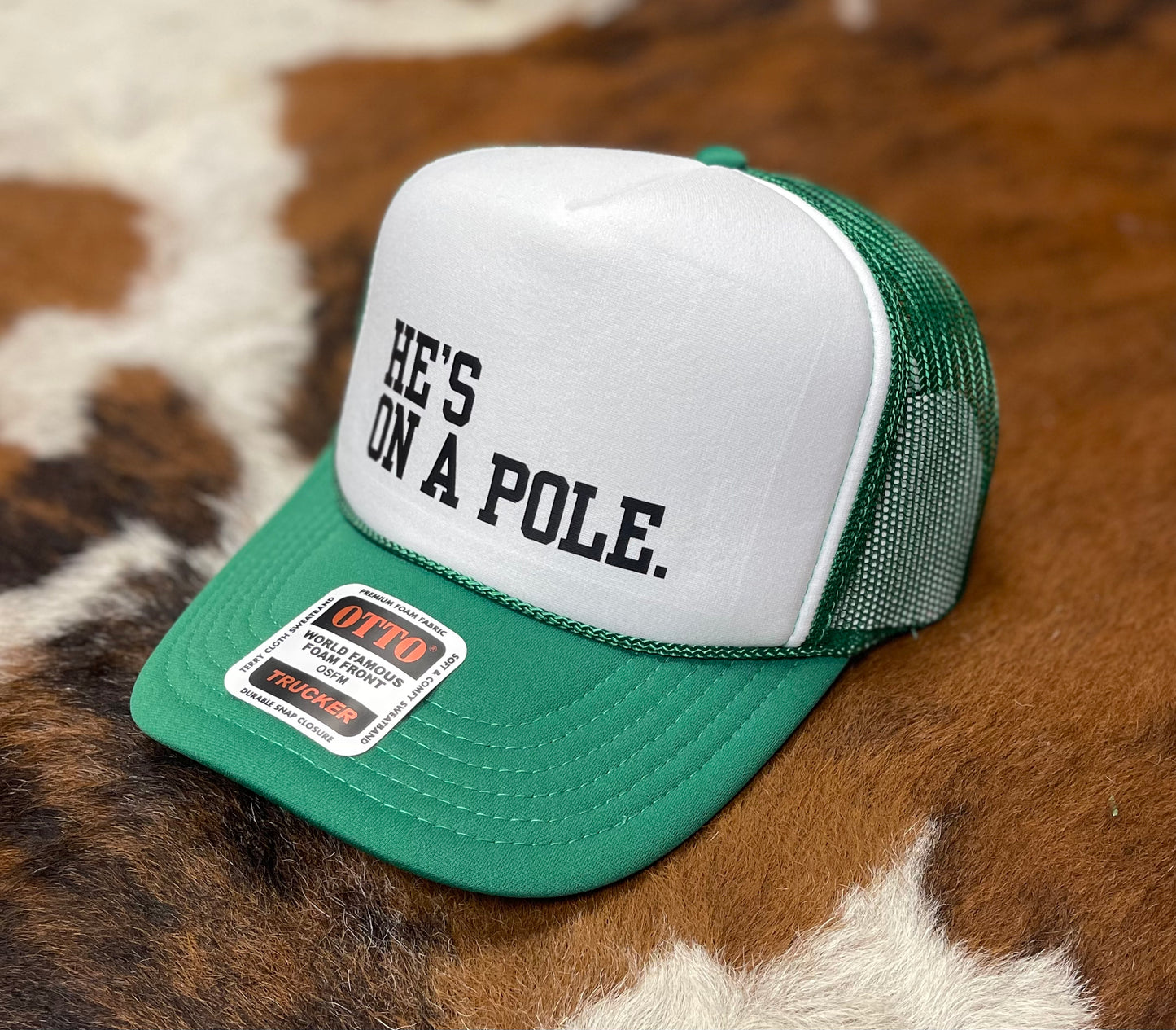 He's On A Pole Trucker Hat