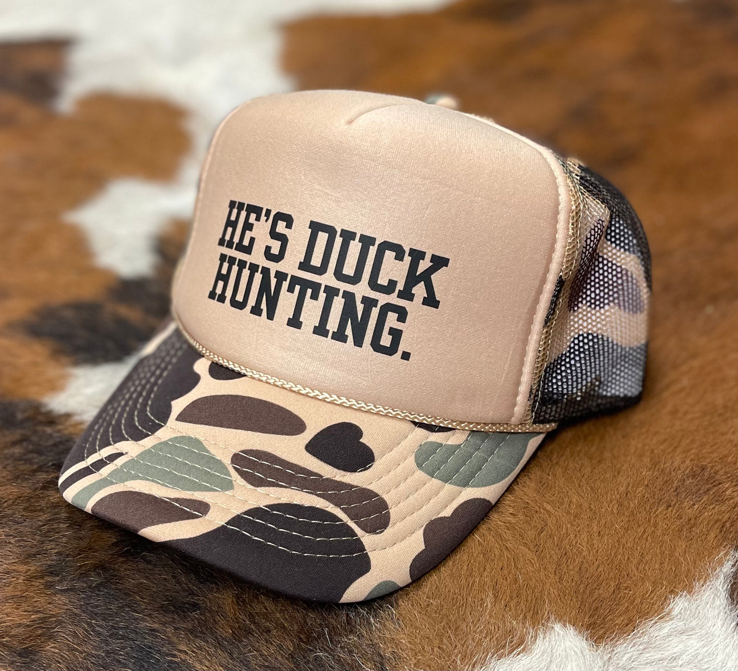 He's Duck Hunting Trucker Hat